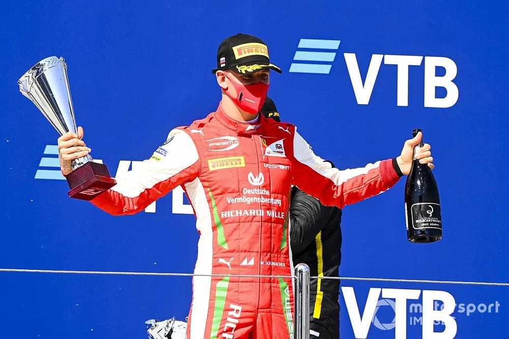 Mick Schumacher, Prema Racing celebrates on the podium with the champagne and the trophy