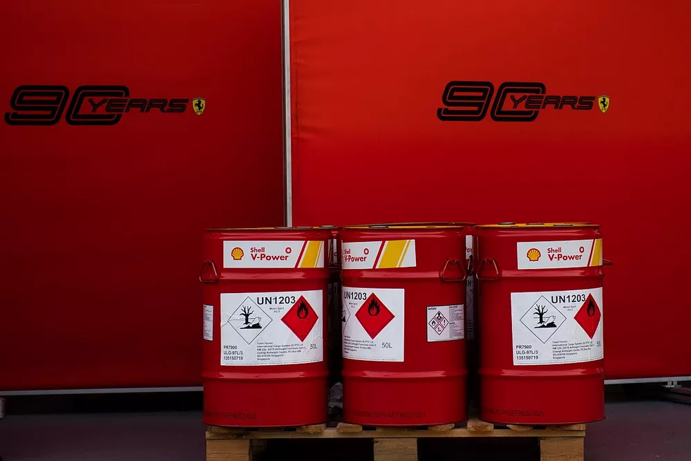 Ferrari Shell fuel drums in the paddock