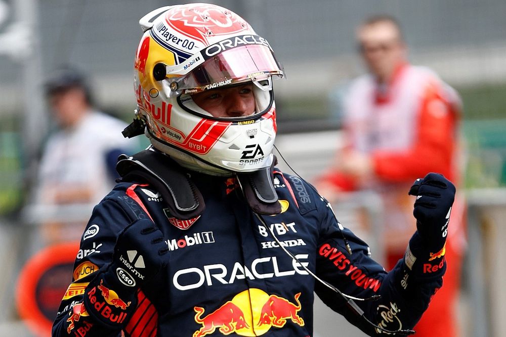 Max Verstappen, Red Bull Racing RB19, celebrates in Parc Ferme after securing pole 
