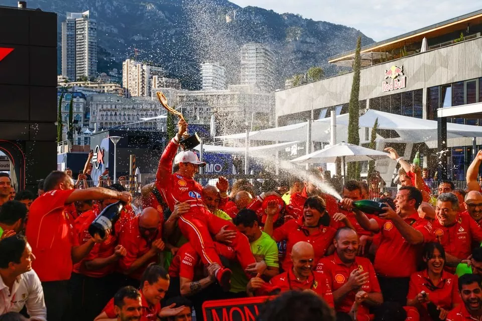 Charles Leclerc, Scuderia Ferrari, 1st position, the Ferrari team celebrate after the race