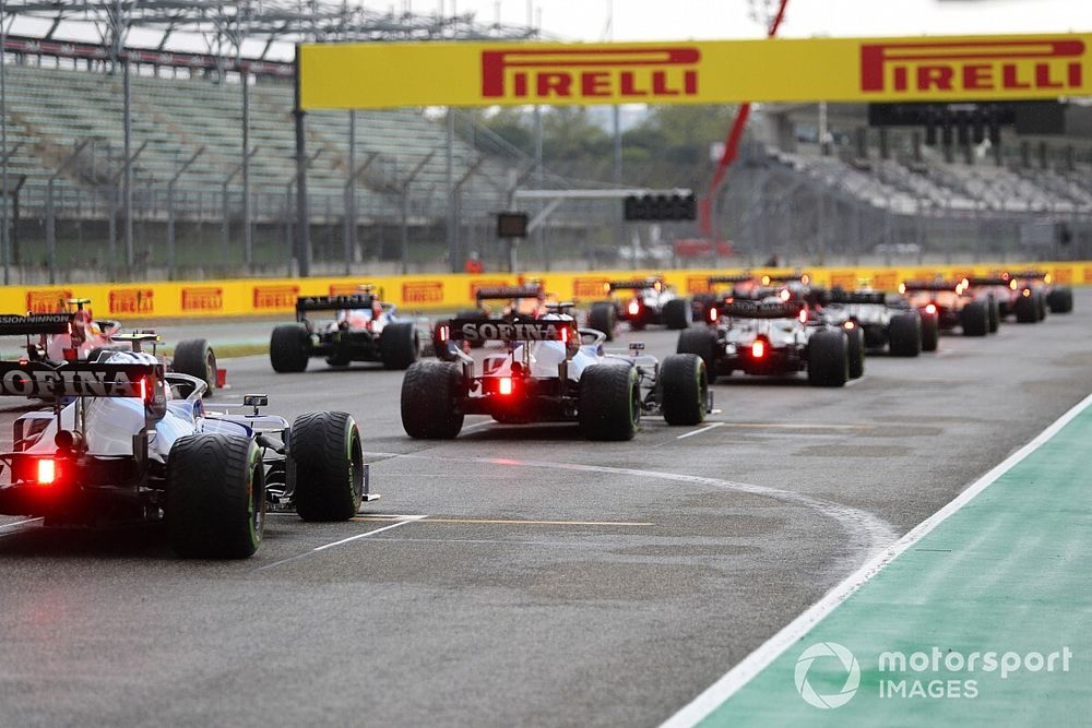 The drivers line up for the start