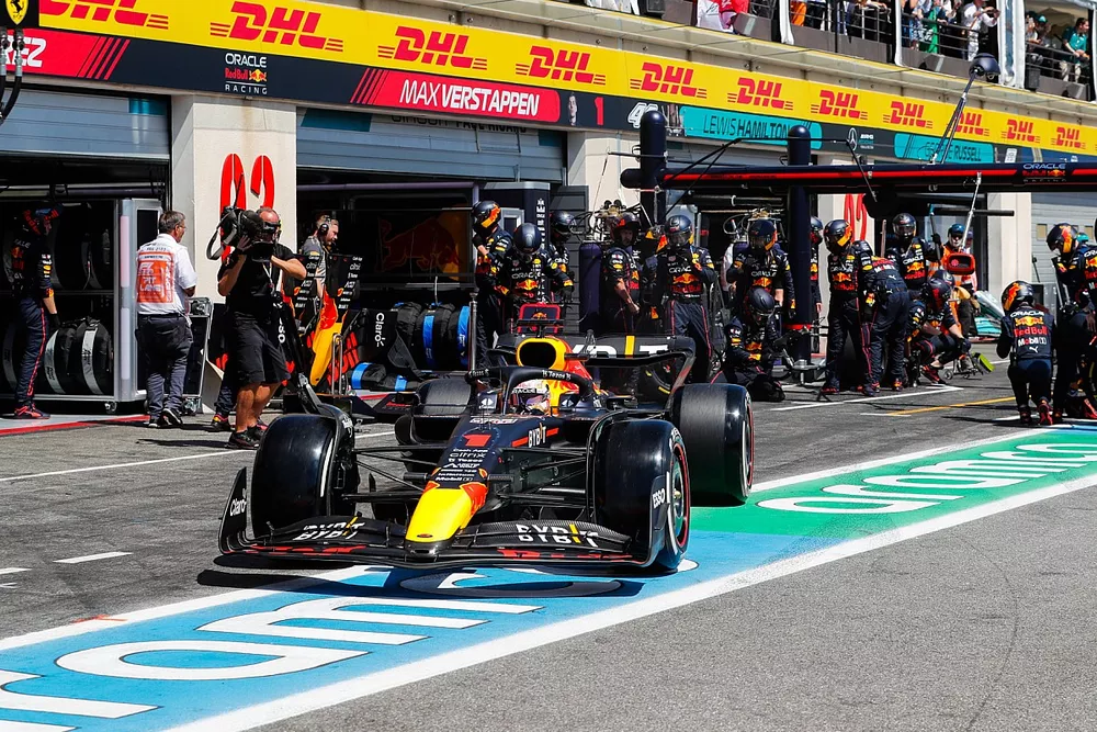 Max Verstappen, Red Bull Racing RB18, leaves his pit box after a stop