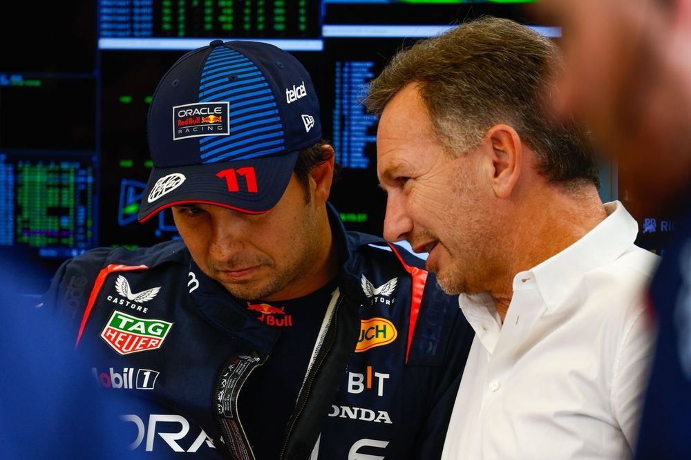 Sergio Perez, Red Bull Racing, talks to Christian Horner, Team Principal, Red Bull Racing