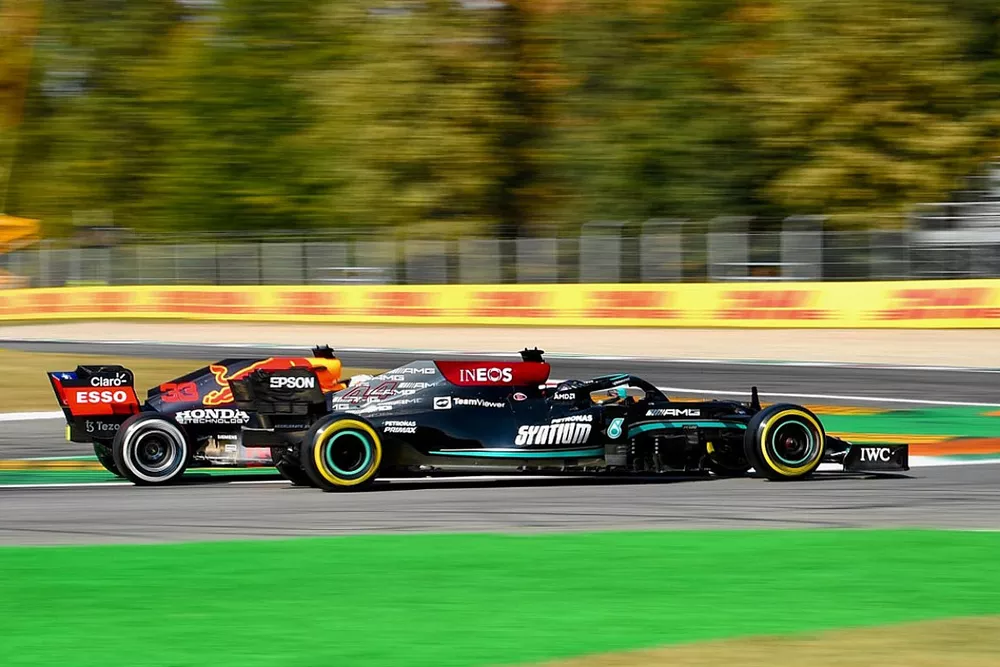 Lewis Hamilton, Mercedes W12 and Max Verstappen, Red Bull Racing RB16B collide