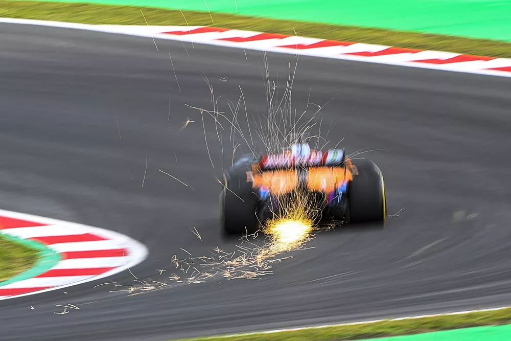 Sparks fly from Daniel Ricciardo, McLaren MCL35M