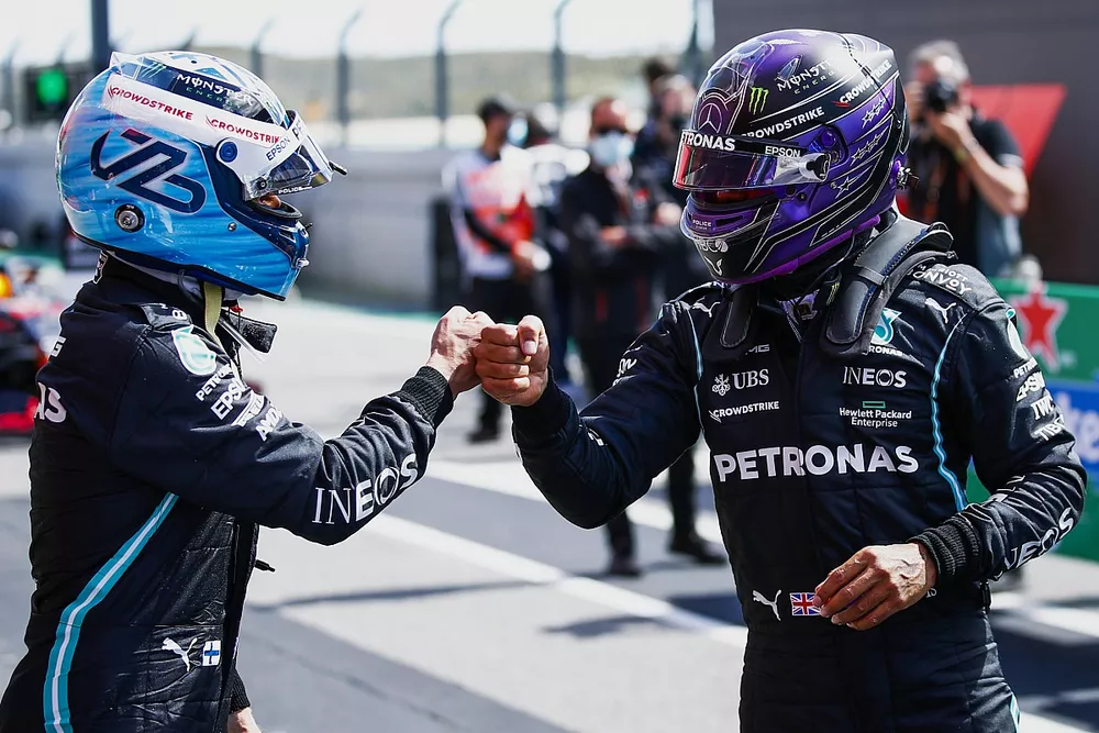 Pole man Valtteri Bottas, Mercedes, is congratulated by Lewis Hamilton, Mercedes, in Parc Ferme
