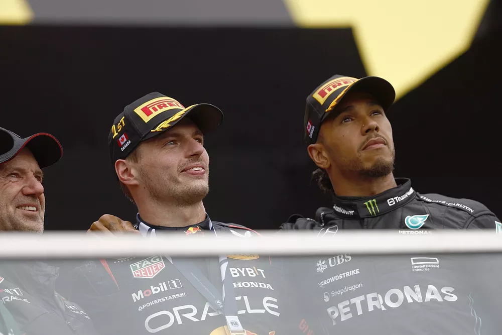 Adrian Newey, Chief Technology Officer, Red Bull Racing, Max Verstappen, Red Bull Racing, 1st position, and Sir Lewis Hamilton, Mercedes-AMG, 3rd position, on the podium