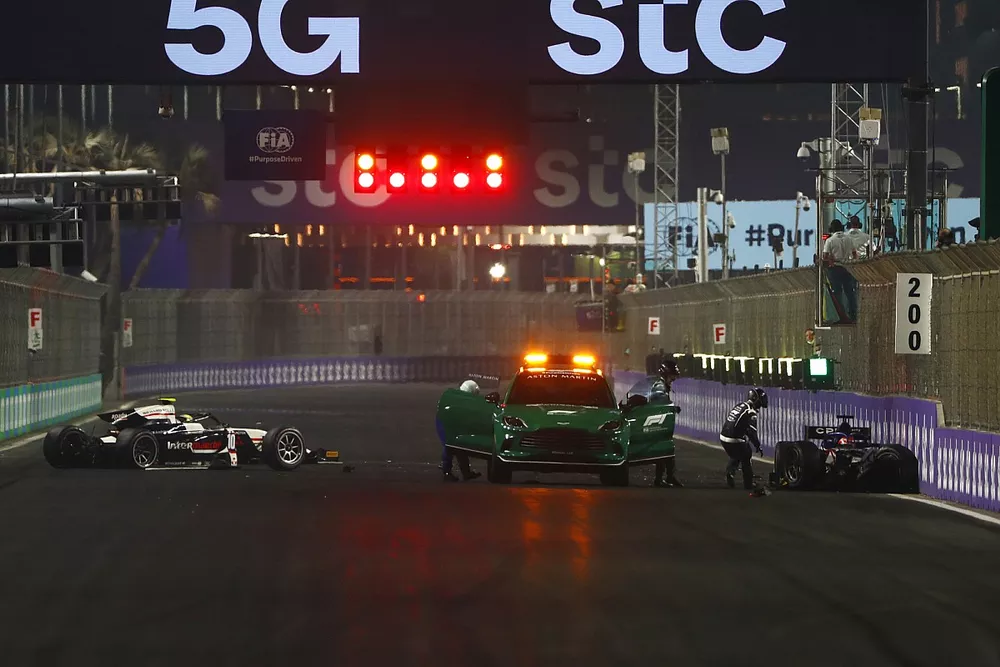 Medical personnel attend to Theo Pourchaire, ART Grand Prix and Enzo Fittipaldi, Charouz Racing System following a start line accident