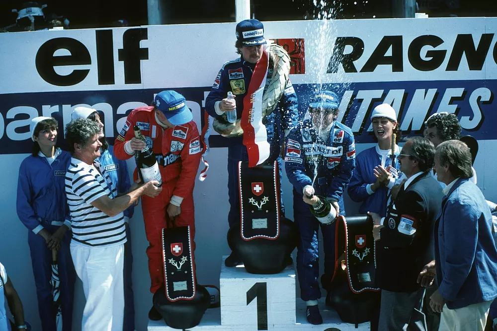 Podio: Tercer lugar Niki Lauda, McLaren, ganador de la carrera Keke Rosberg, Williams, segundo lugar Alain Prost, Renault