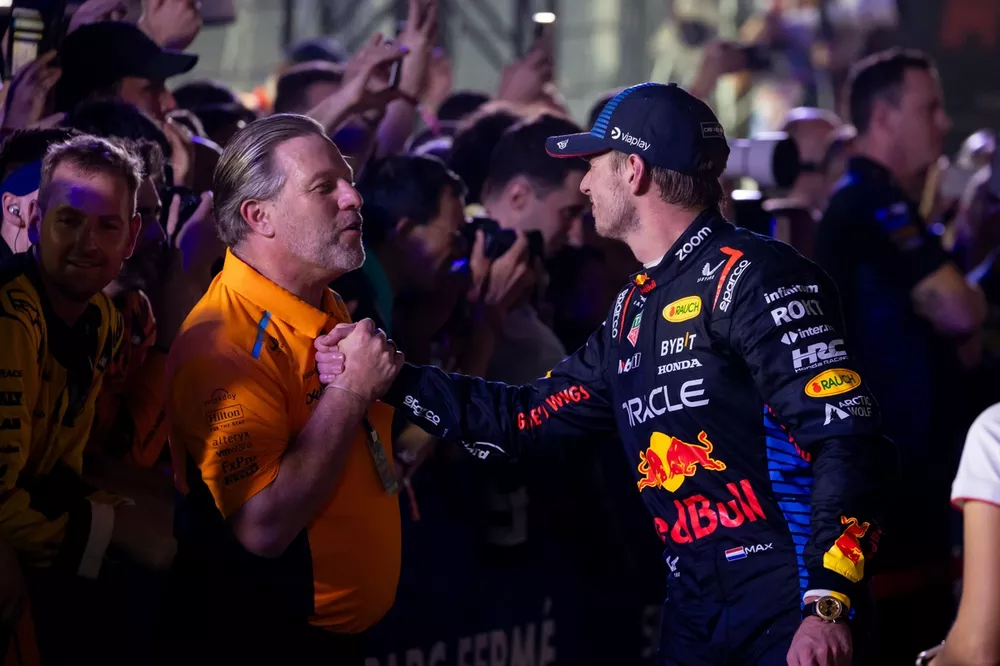 Zak Brown, CEO, McLaren Racing, and Max Verstappen, Red Bull Racing, 2nd position, congratulate each other in Parc Ferme