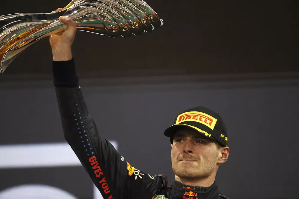 Max Verstappen, Red Bull Racing, 1st position, lifts his trophy