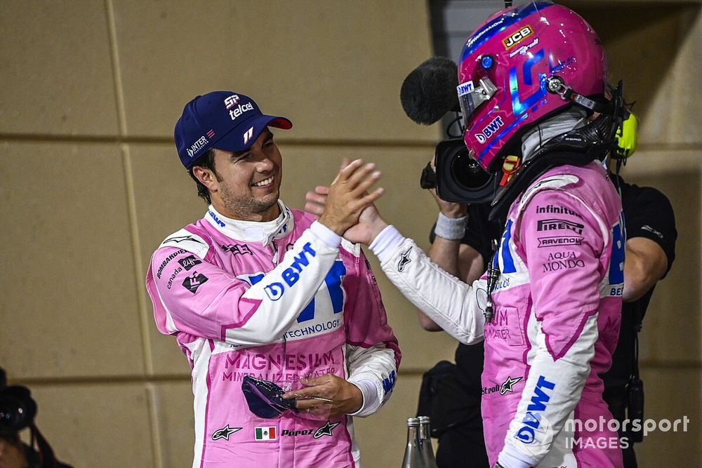 Sergio Perez, Racing Point, 1st position, and Lance Stroll, Racing Point, 3rd position, celebrate in Parc Ferme