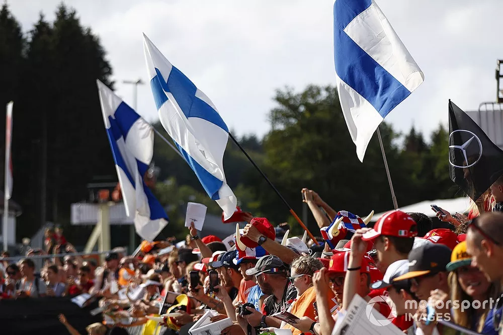 Finnish flags among a crowd of fans
