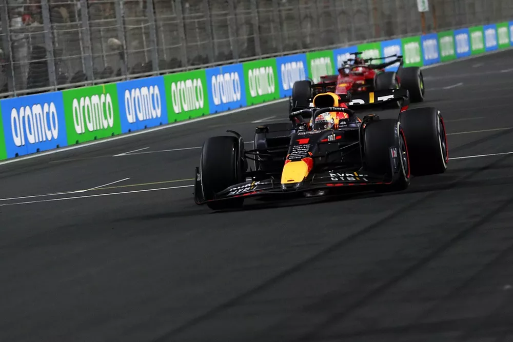 Max Verstappen, Red Bull Racing RB18, 1st position, takes victory ahead of Charles Leclerc, Ferrari F1-75, 2nd position