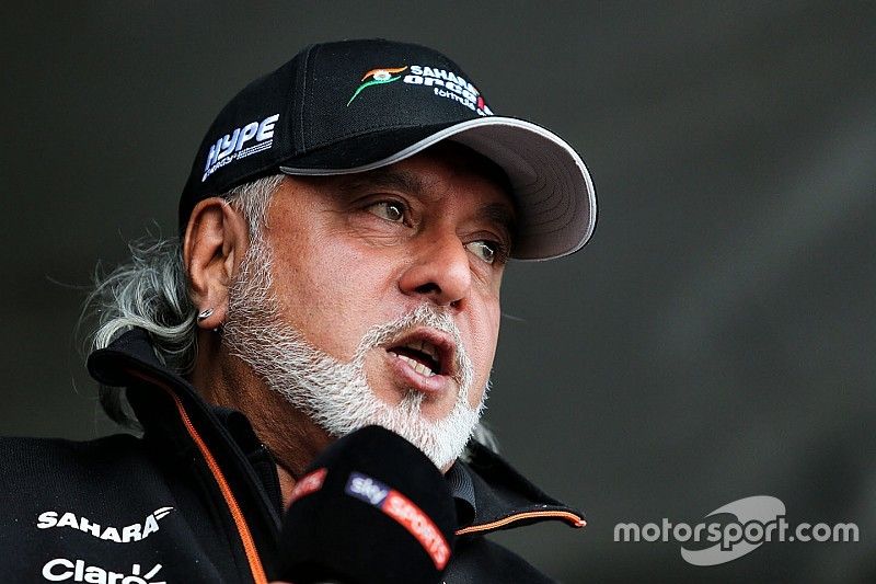 Dr. Vijay Mallya, Sahara Force India Formula One Team Owner with a Kingfisher rickshaw