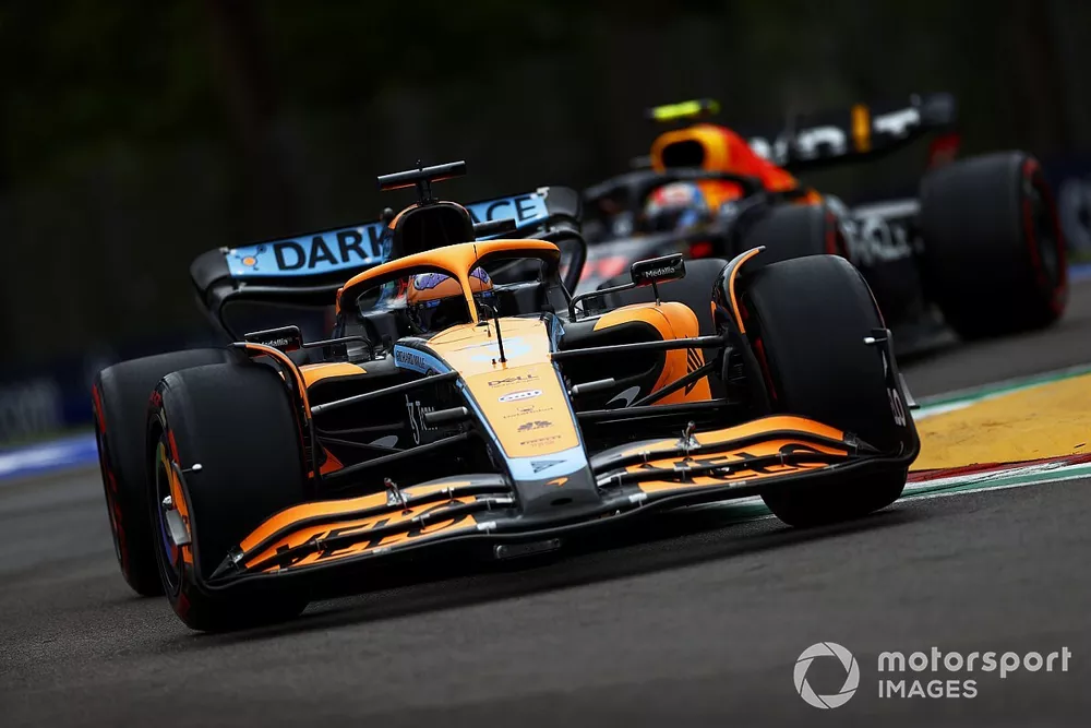 Daniel Ricciardo, McLaren MCL36, Sergio Perez, Red Bull Racing RB18