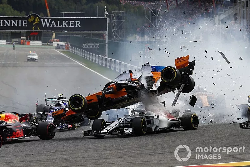 Fernando Alonso, McLaren MCL33, crashes over Charles Leclerc, Sauber C37, after contact from Nico Hulkenberg, Renault Sport F1 Team R.S. 18, at the start