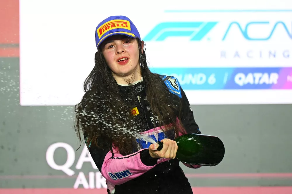 Second place and 2024 F1 Academy Champion Abbi Pulling, Rodin Motorsport celebrates on the podium