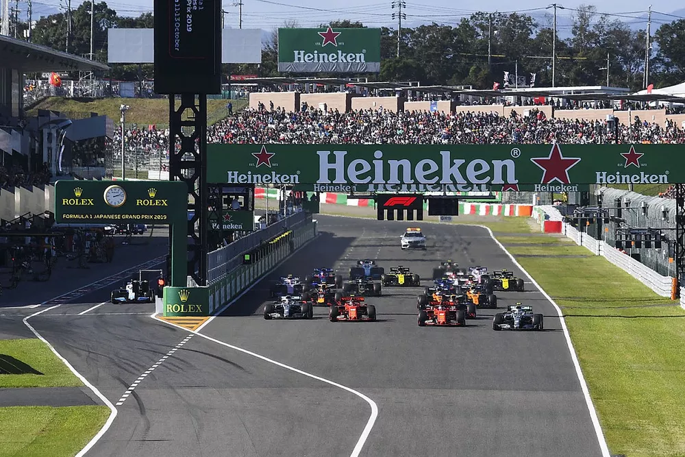 Valtteri Bottas, Mercedes AMG W10, takes the lead at the start ahead of Sebastian Vettel, Ferrari SF90, Charles Leclerc, Ferrari SF90, Lewis Hamilton, Mercedes AMG F1 W10, Max Verstappen, Red Bull Racing RB15, and the rest of the field
