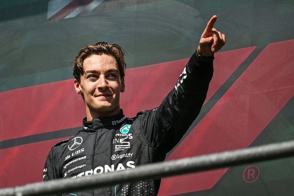 George Russell, Mercedes-AMG F1 Team, 1st position, celebrates on the podium 