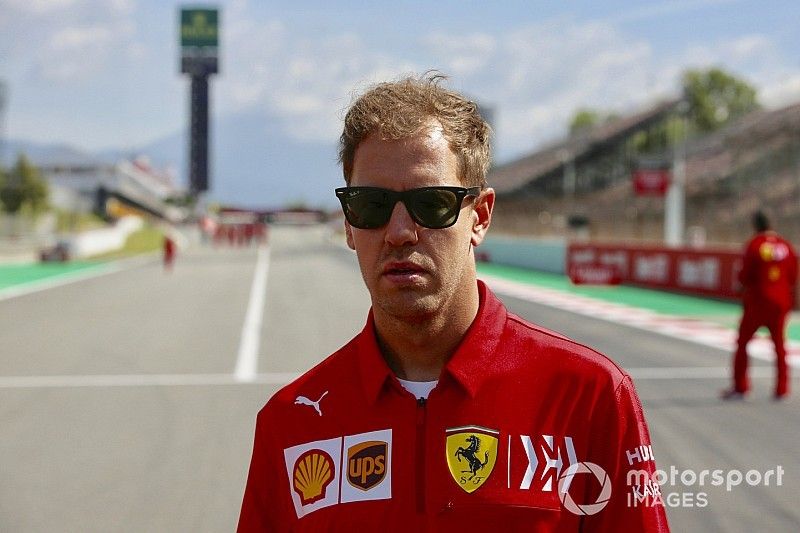 Sebastian Vettel, Ferrari, walks the track