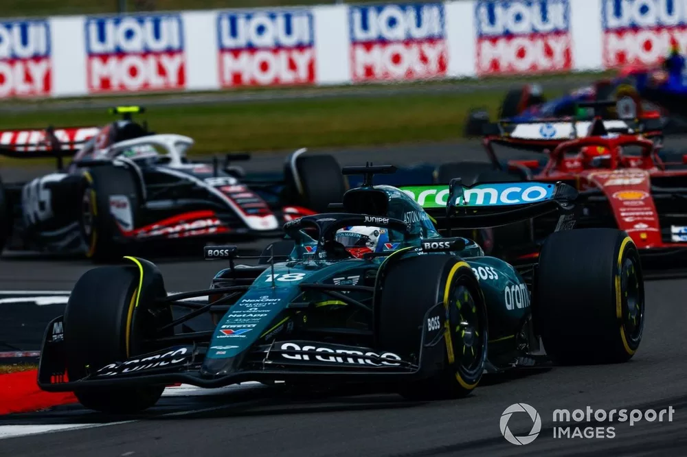 Lance Stroll, Aston Martin AMR24, Carlos Sainz, Ferrari SF-24 and Nico Hulkenberg, Haas VF-24