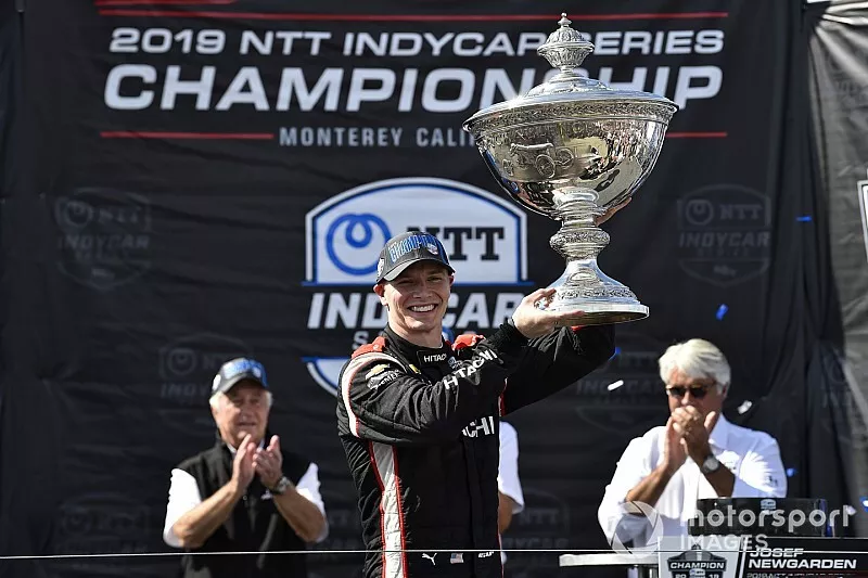 Josef Newgarden, Team Penske Chevrolet celebrates NTT IndyCar championship on podium with Astor Cup