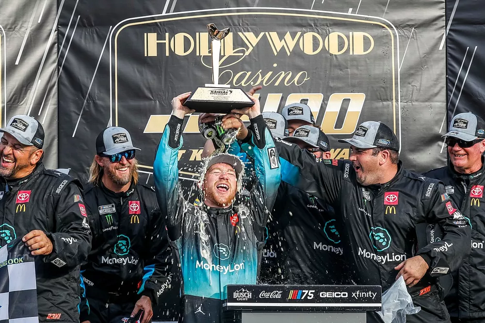 Tyler Reddick, 23XI Racing, MoneyLion Toyota Camry in victory lane