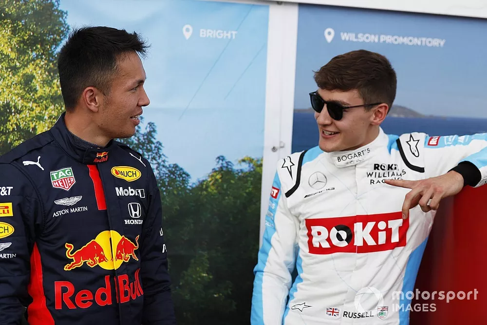 Alex Albon, Red Bull Racing, with George Russell, Williams Racing