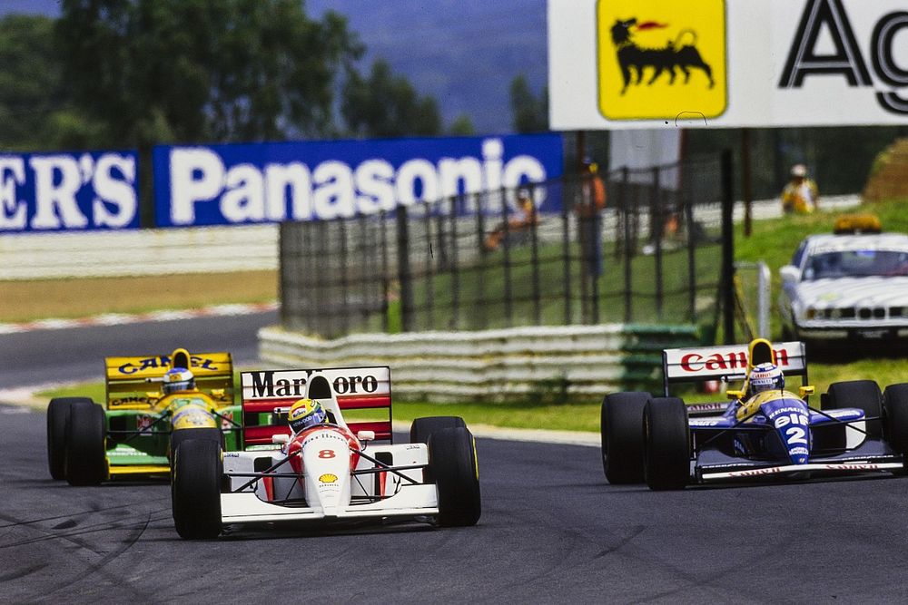 Ayrton Senna, McLaren MP4-8, leads Alain Prost, Williams FW15C, and Michael Schumacher, Benetton B193A