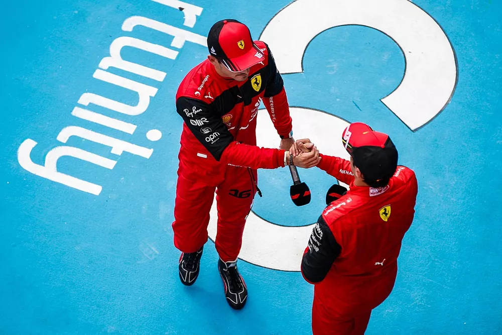 Charles Leclerc, Ferrari, Carlos Sainz, Ferrari, congratulate each other after Qualifying