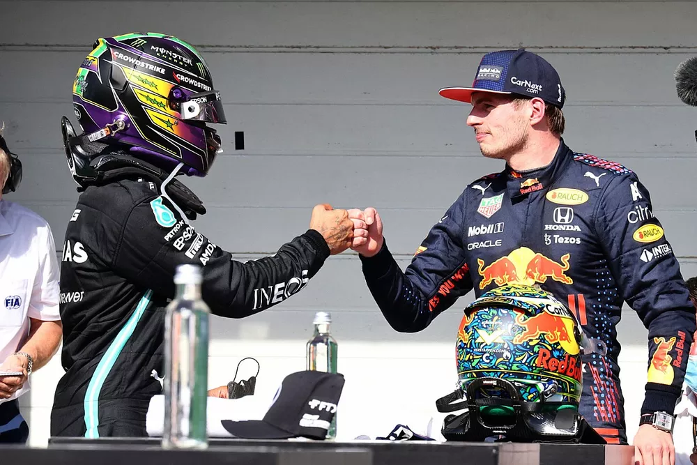 Lewis Hamilton, Mercedes, 1st position, and Max Verstappen, Red Bull Racing, 2nd position, congratulate each other in Parc Ferme