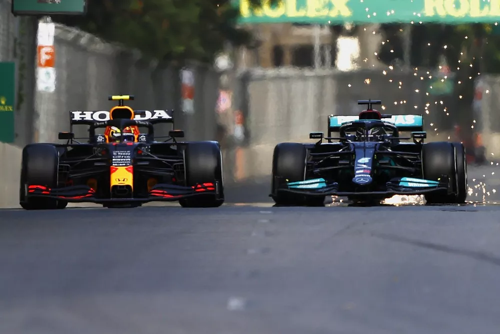 Sergio Perez, Red Bull Racing RB16B, battles with Lewis Hamilton, Mercedes W12