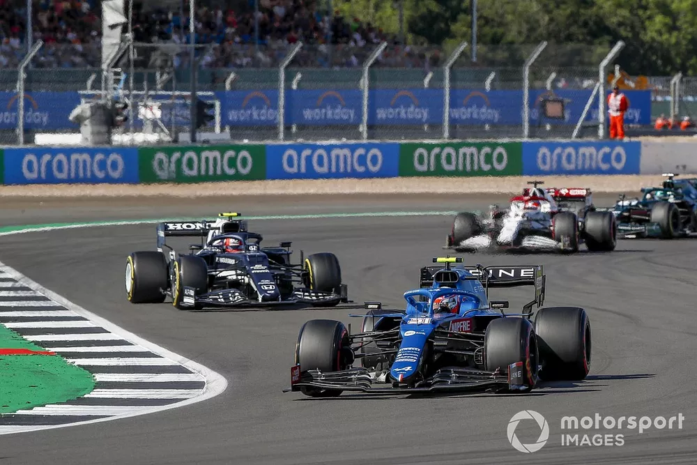 Esteban Ocon, Alpine A521, Pierre Gasly, AlphaTauri AT02, and Kimi Raikkonen, Alfa Romeo Racing C41
