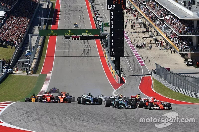 Sebastian Vettel, Ferrari SF70H and Lewis Hamilton, Mercedes-Benz F1 W08  at the start of the race