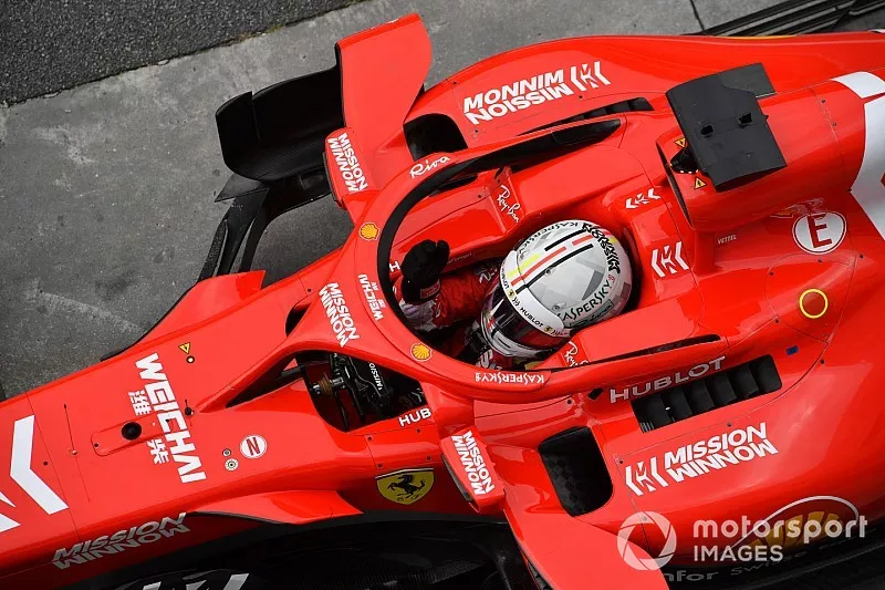 Sebastian Vettel, Ferrari SF71H waves his hands when on the weighbridge during Q2 