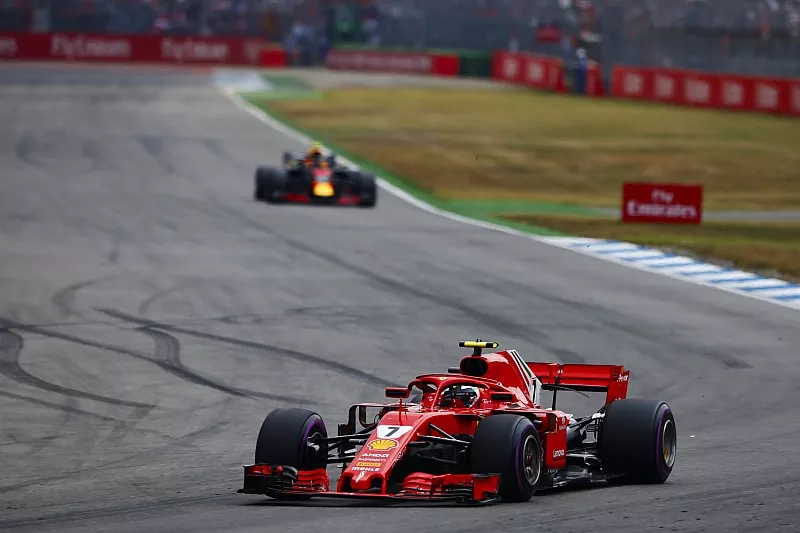 Kimi Raikkonen, Ferrari SF71H, leads Max Verstappen, Red Bull Racing RB14