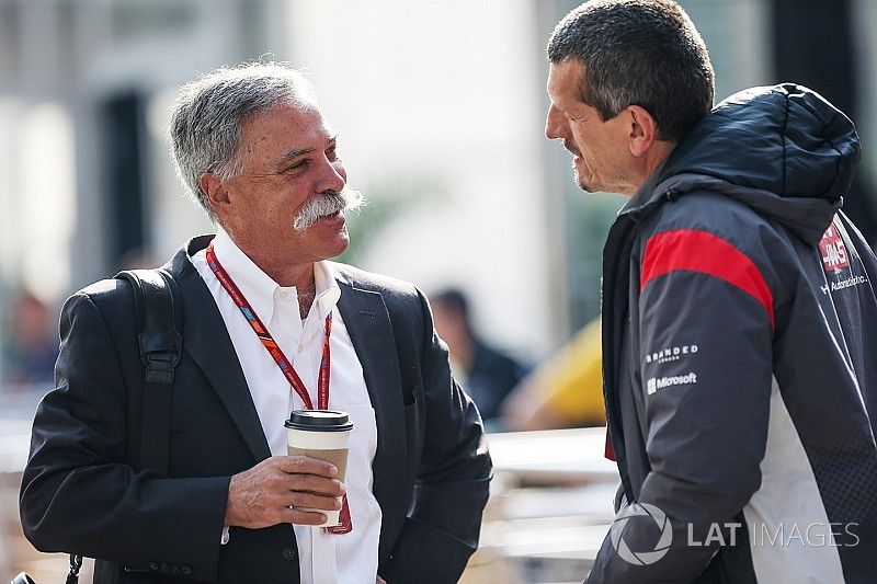 Chase Carey, Chief Executive Officer and Executive Chairman of the Formula One Group and Guenther Steiner, Haas F1 Team Principal