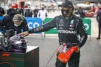 Hamilton presented with Schumacher helmet after record win