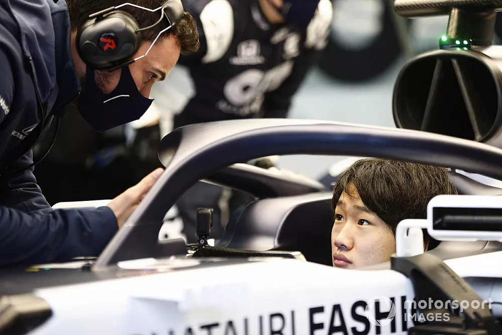 Yuki Tsunoda, Honda Formula Dream Project sits in his car in the garage