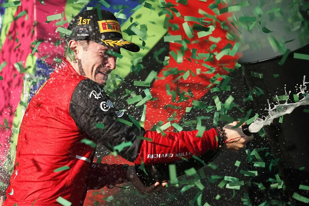 Charles Leclerc, Ferrari, celebrates his victory on the podium