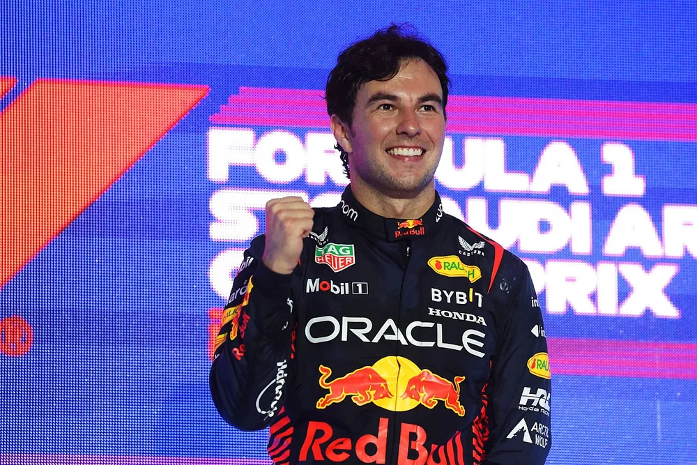 Sergio Perez, Red Bull Racing, 1st position, on the podium