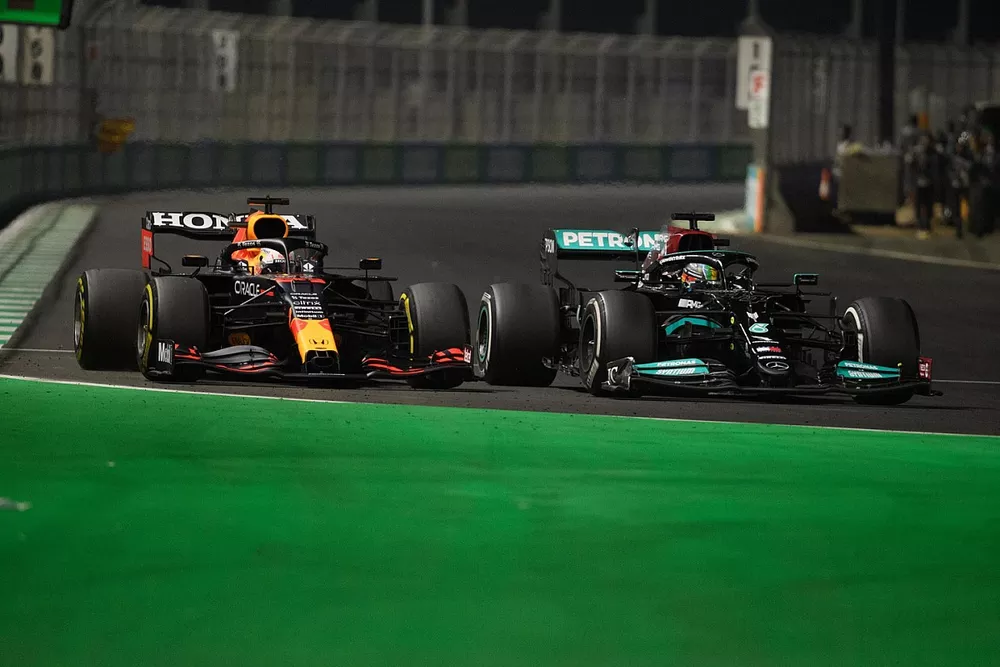 Lewis Hamilton, Mercedes W12, battles with Max Verstappen, Red Bull Racing RB16B