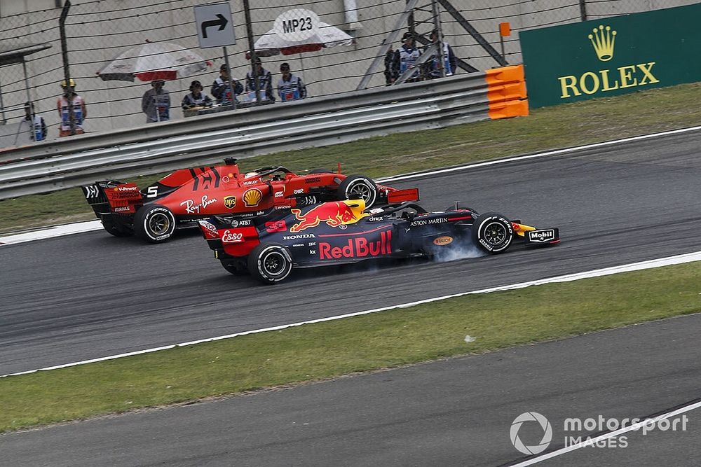 Sebastian Vettel, Ferrari SF90 and Max Verstappen, Red Bull Racing RB15 battle 