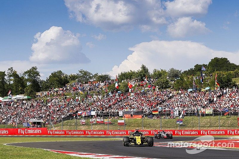 Nico Hulkenberg, Renault Sport F1 Team R.S. 18, y Romain Grosjean, Haas F1 Team VF-18