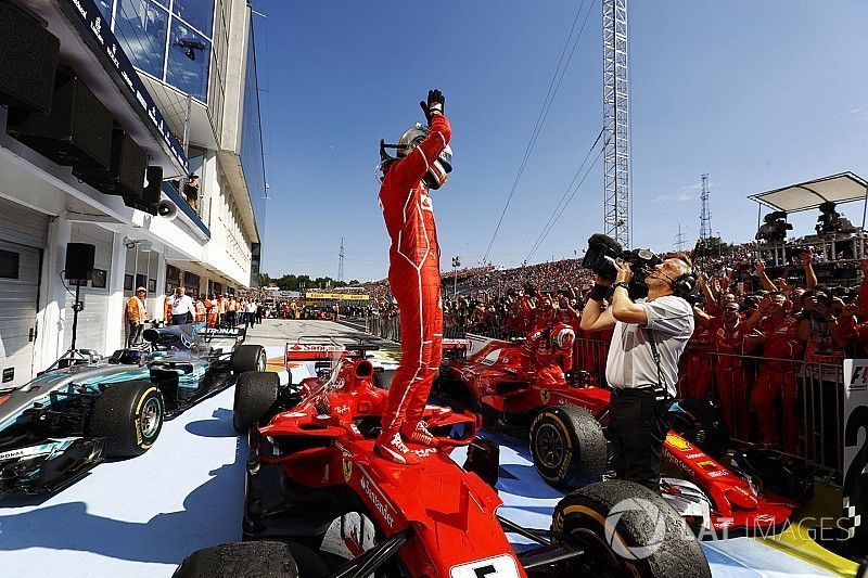 Sebastian Vettel, Ferrari, celebrates victory in parc ferme