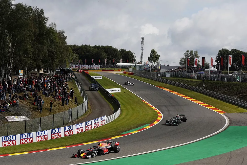 Max Verstappen, Red Bull Racing RB16B, Valtteri Bottas, Mercedes W12, and Nikita Mazepin, Haas, VF-21