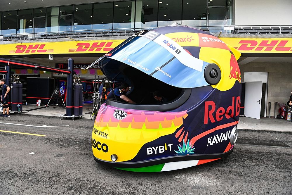 The Red Bull helmet car in the pit lane