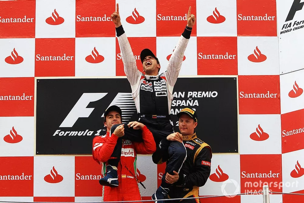 Podium: race winner Pastor Maldonado, Williams, second place Fernando Alonso, Ferrari, and third place Kimi Raikkonen, Lotus F1