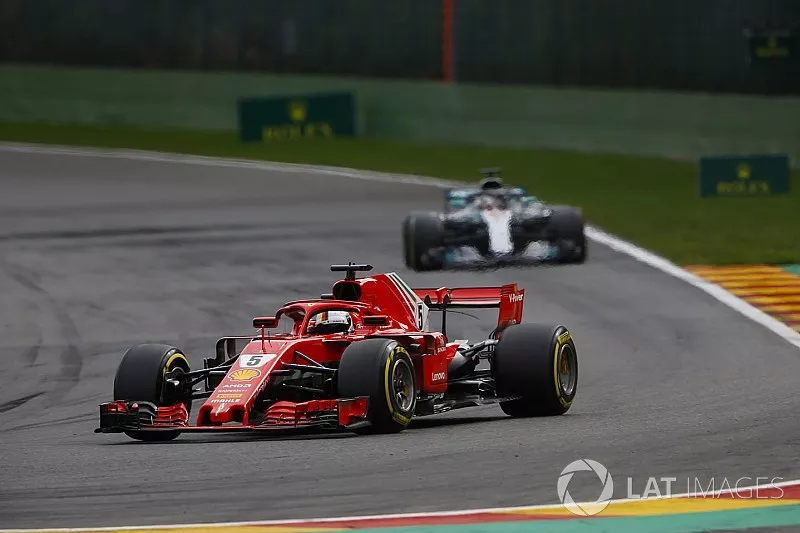 Sebastian Vettel, Ferrari SF71H, leads Lewis Hamilton, Mercedes AMG F1 W09